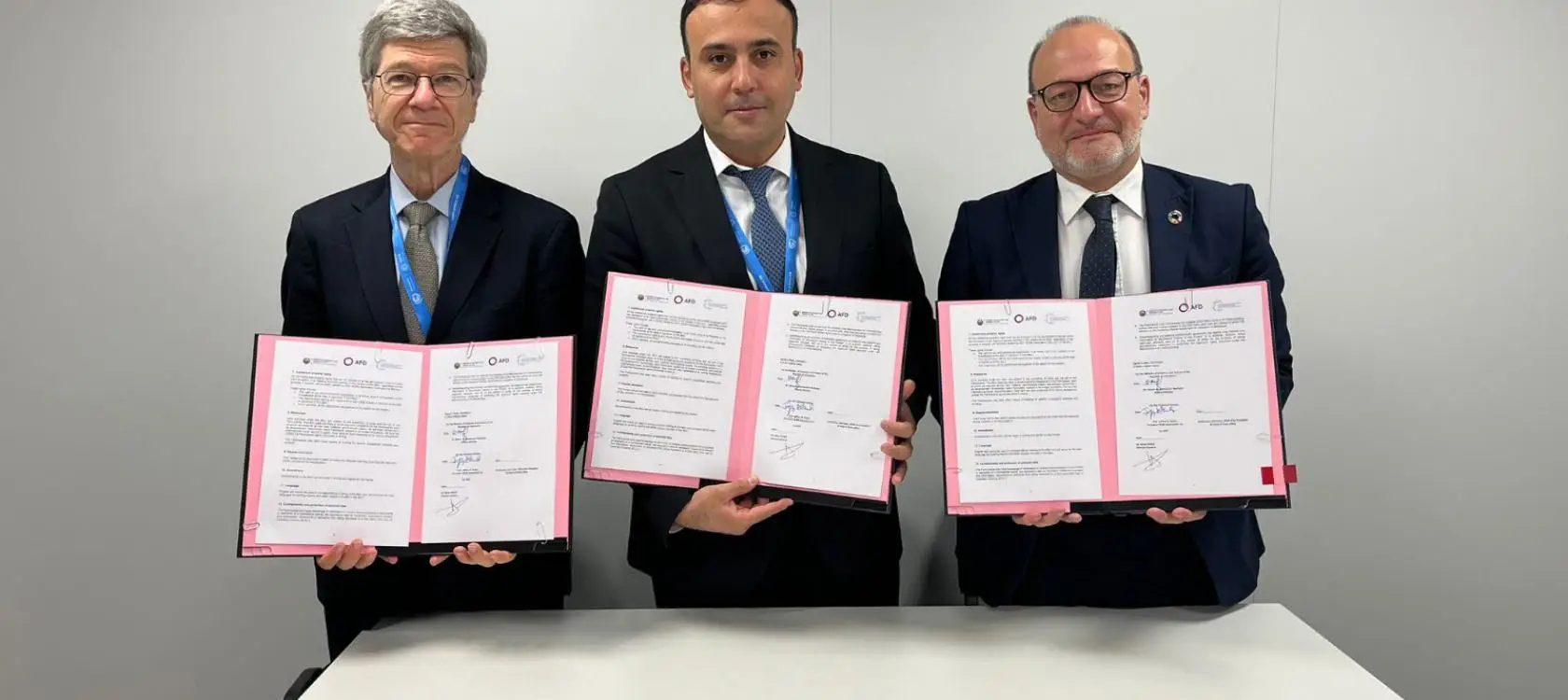 SDSN's President Prof. Jeffrey D. Sachs, Ilkhom Norkulov, First Deputy Minister of Economy and Finance of Uzbekistan, and Rémy Rioux, CEO of AFD, signing a MoU